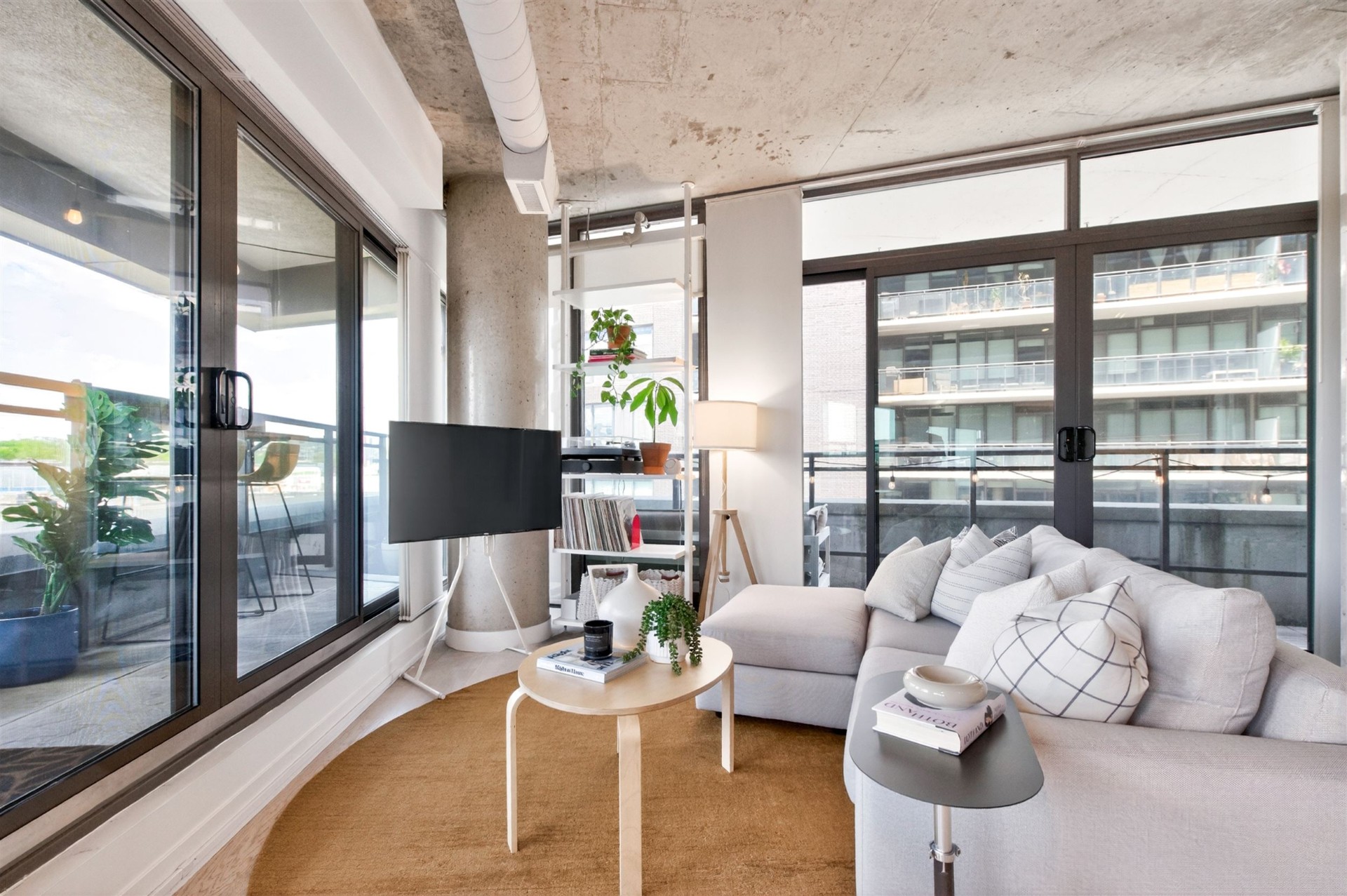 Living room with record shelf and balcony access