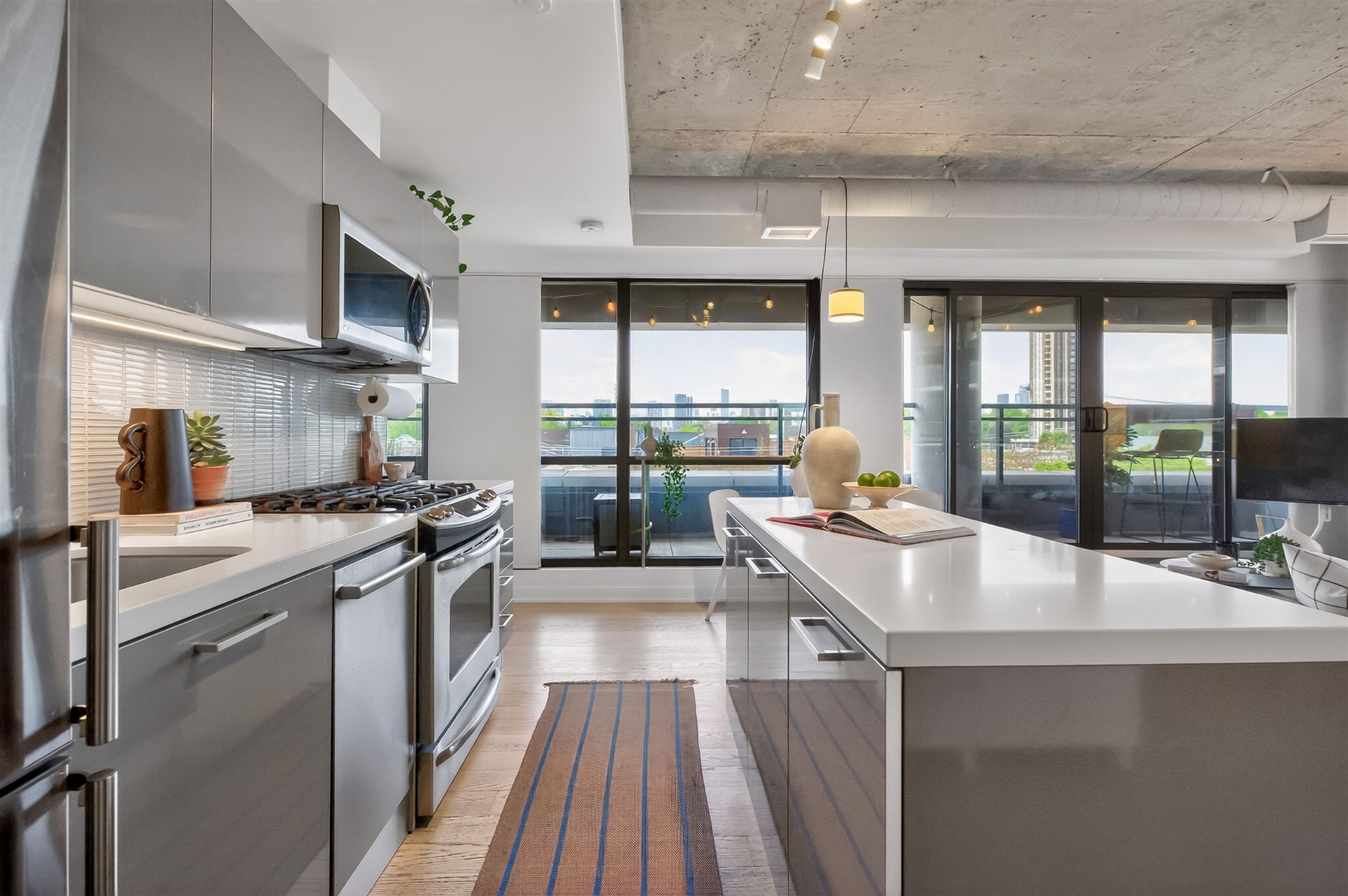 Kitchen with stainless appliances and gas range